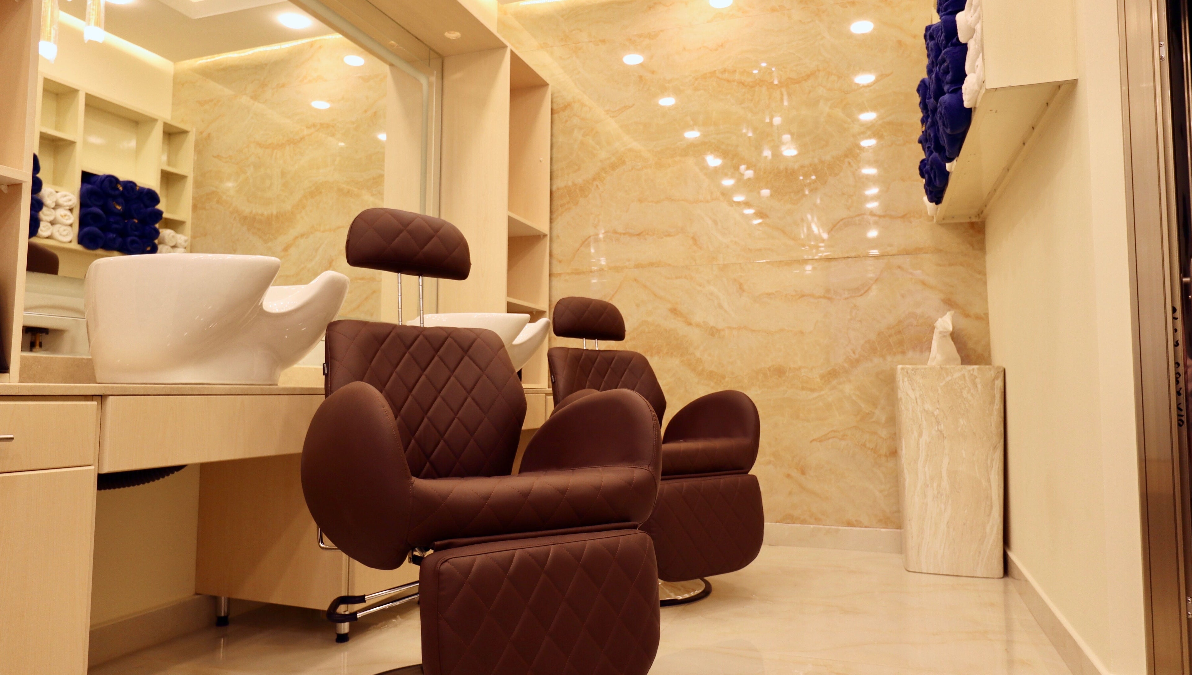 Luxurious salon chairs and wash area at New Tec Saloon, Dubai, Dubai, AE.