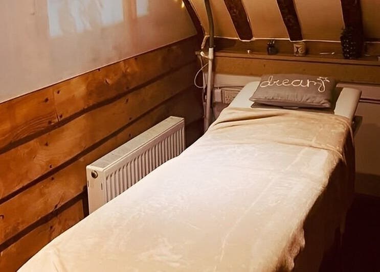Cozy massage room at Hair By Carla in Salisbury, England, GB offers a tranquil wellness experience.