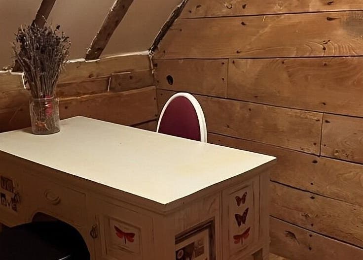 Rustic desk and chair setup at Hair By Carla in Salisbury, England, GB.