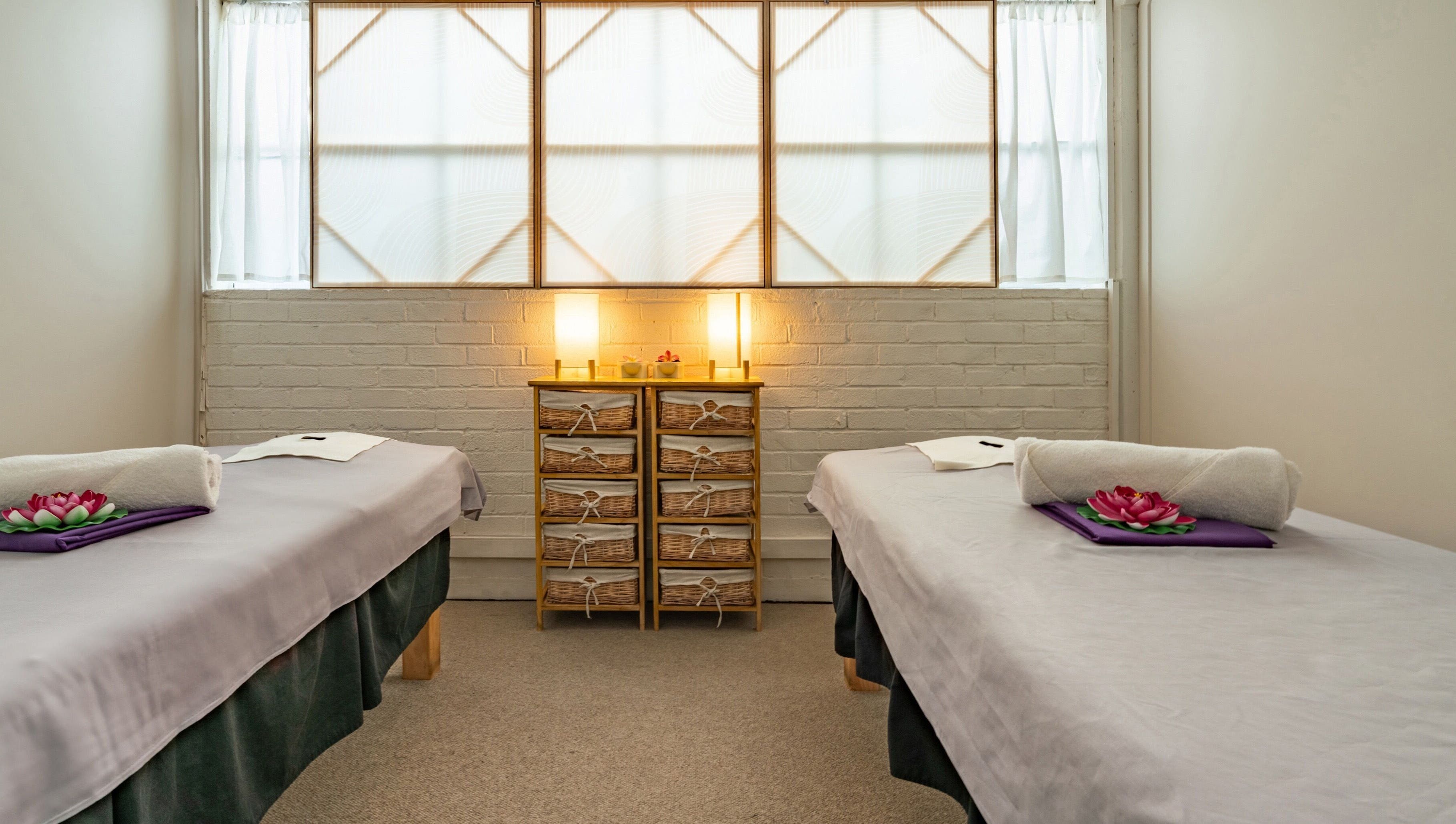 Peaceful treatment room at Thammarat Thai Massage in Ponsonby, Auckland, Auckland, NZ with two massage beds.