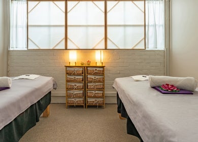 Peaceful treatment room at Thammarat Thai Massage in Ponsonby, Auckland, Auckland, NZ with two massage beds.