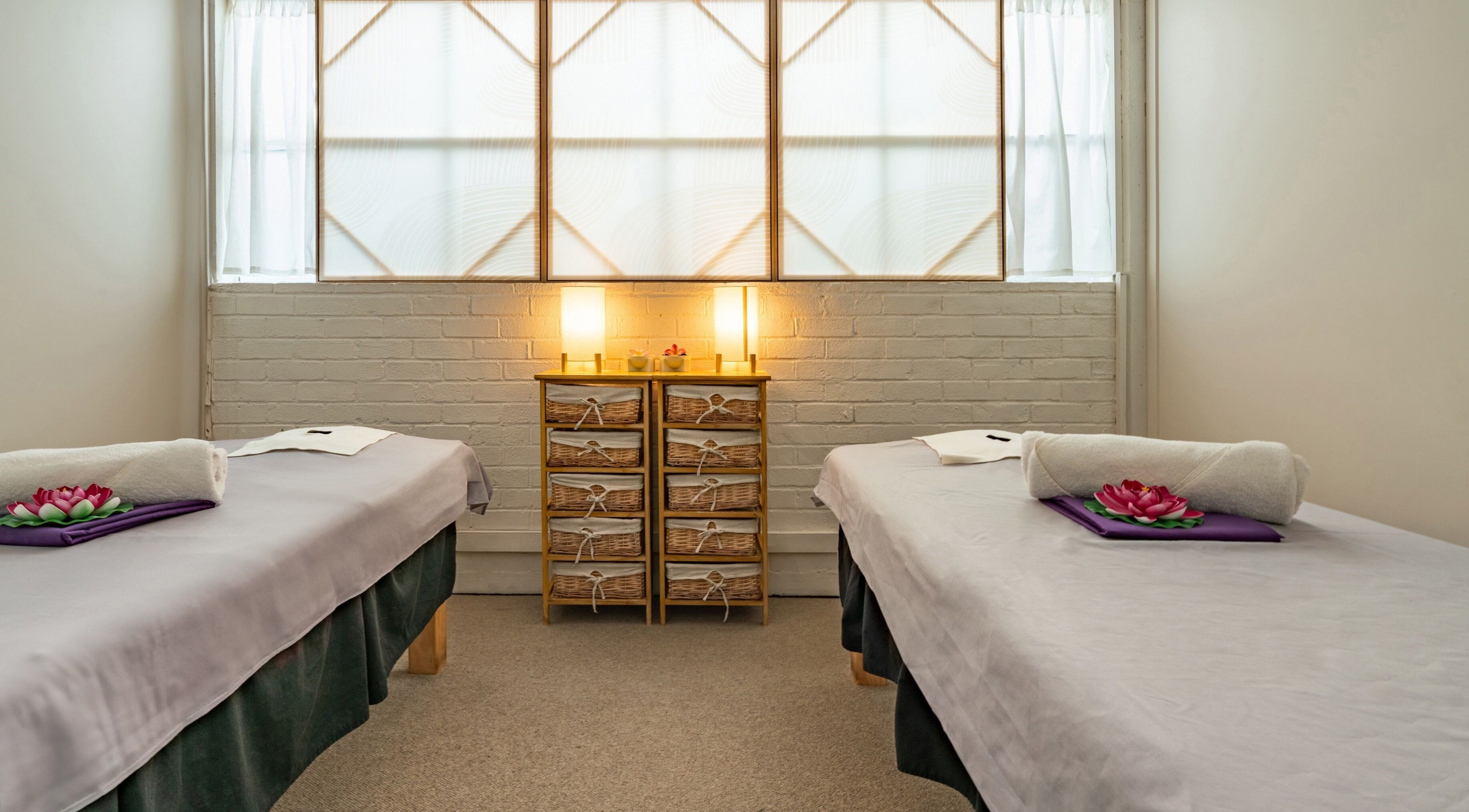 Peaceful treatment room at Thammarat Thai Massage in Ponsonby, Auckland, Auckland, NZ with two massage beds.