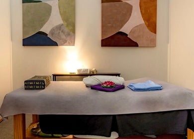 Cozy massage room at Thammarat Thai Massage in Ponsonby, Auckland, NZ with artistic decor.