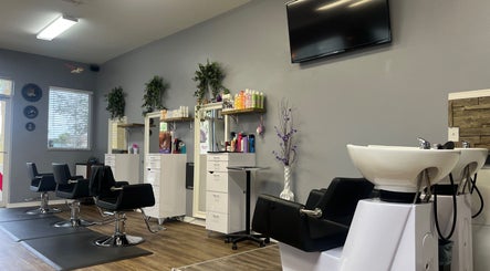 Stylish interior of Beauty Radio Salon in Zephyrhills, Florida, US, showcasing sleek styling chairs and vibrant decor.