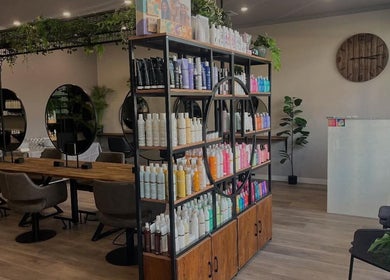 Modern salon interior at Unique Creations for Hair, Australind, Western Australia, featuring stylish decor.
