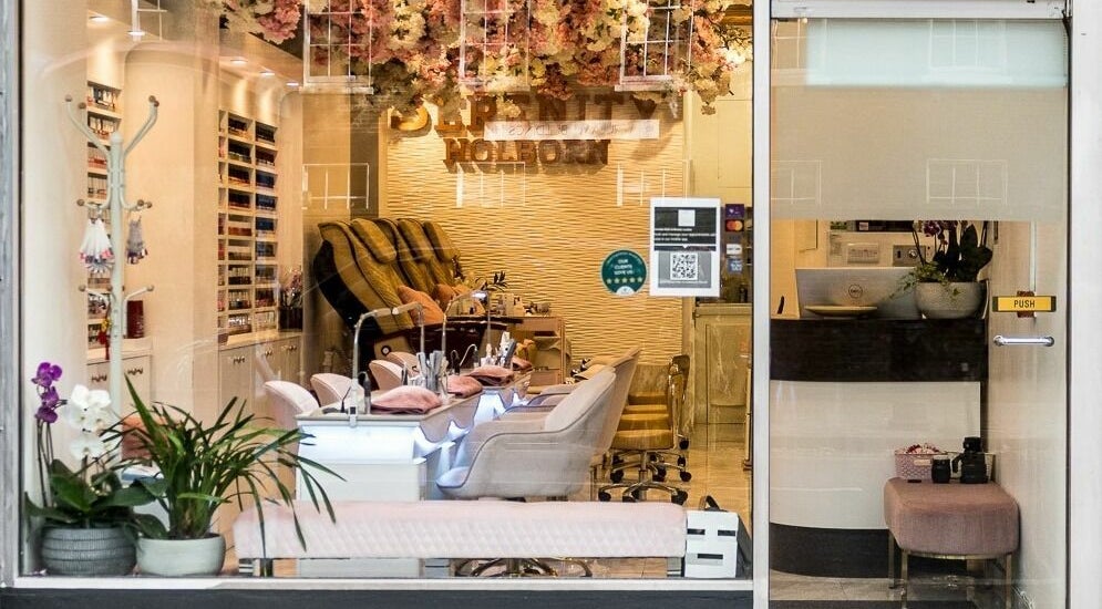 Serenity Holborn interior showcases a tranquil spa setting in London, England, GB with plush seating and decor.
