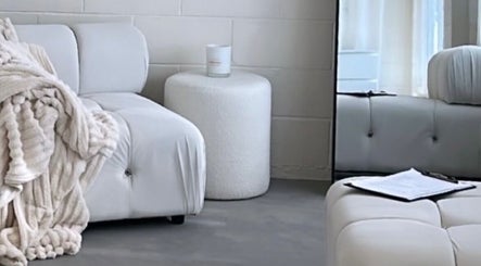Luxurious white seating and decor at Get.Foxxed - SHELLHARBOUR, Warilla, New South Wales, AU.