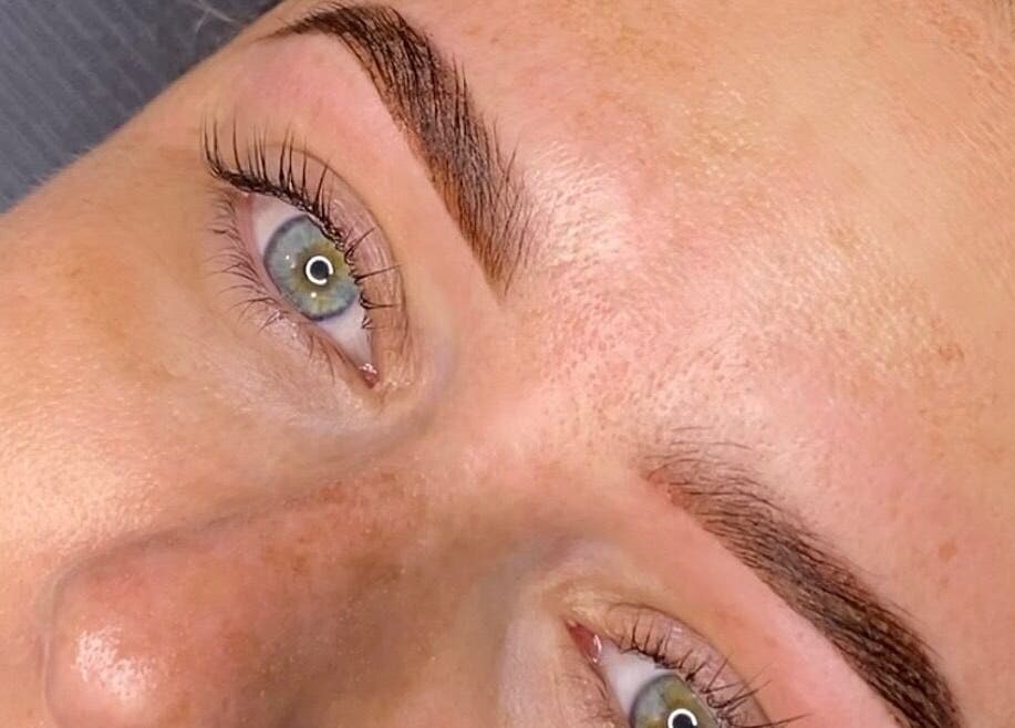 Close-up of perfectly groomed eyebrows at Get.Foxxed - SHELLHARBOUR, Warilla, New South Wales, AU.