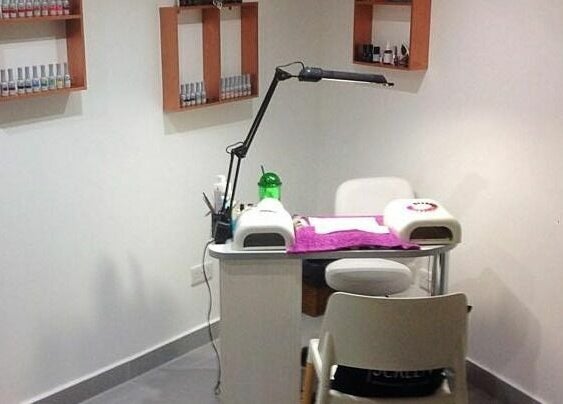 Cozy nail station at Lucie's Nails and Beauty in Tas-Sliema, MT with manicure equipment and polish display.