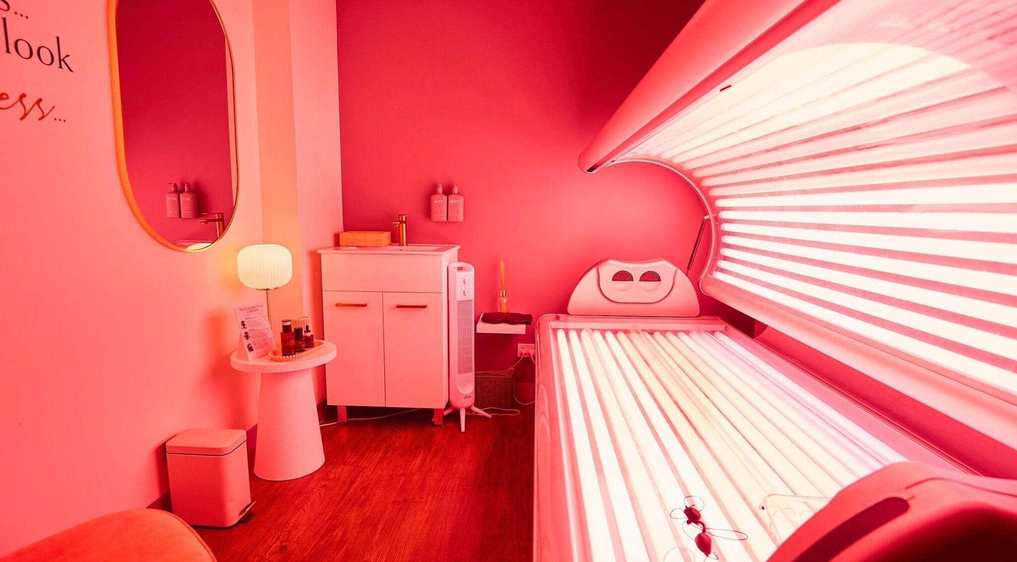 Luxurious tanning bed in vibrant room at Cryospa Clinics, Crows Nest, New South Wales, AU.