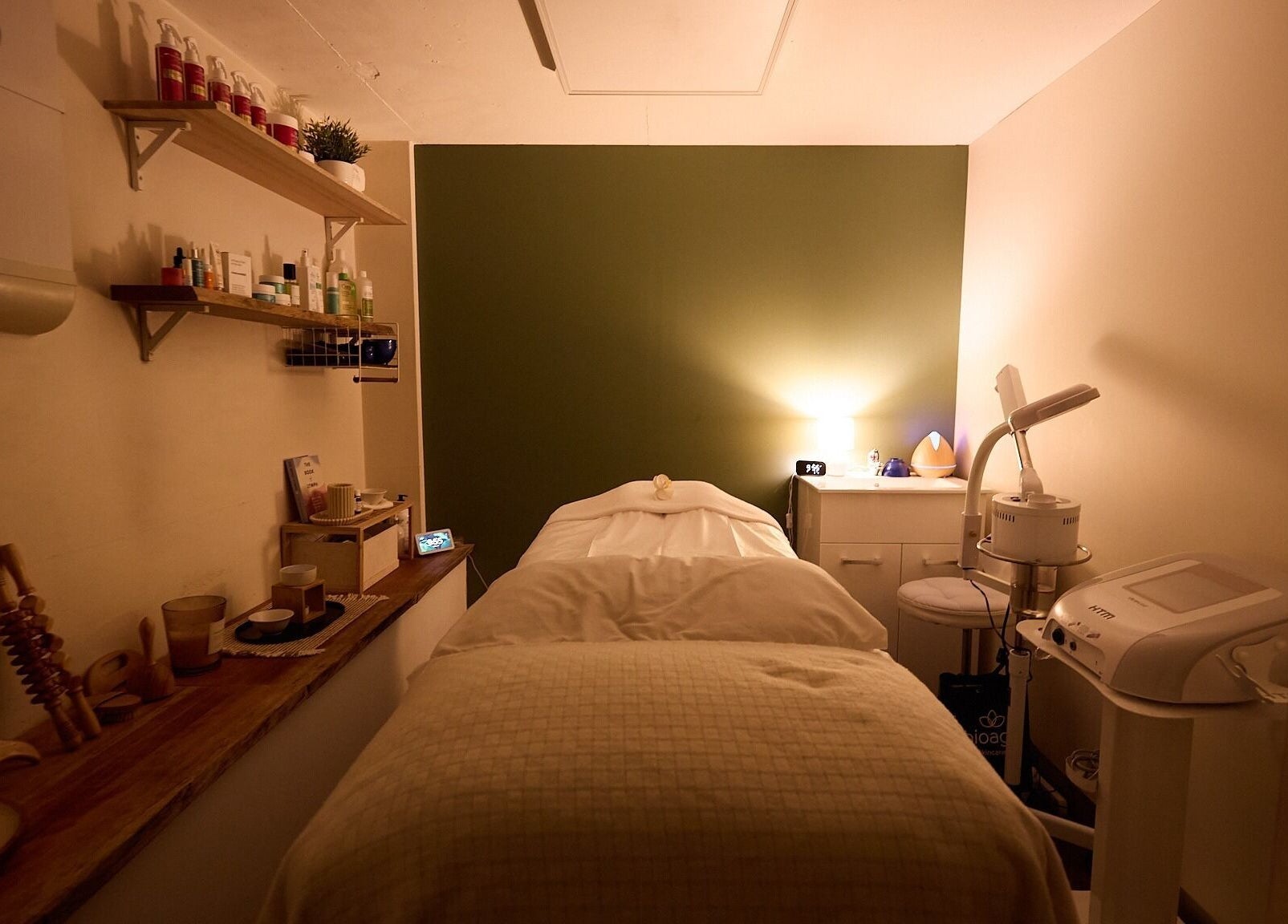 Intimate therapy room at Cryospa Clinics, Crows Nest, New South Wales, AU, with cozy lighting and treatment table.