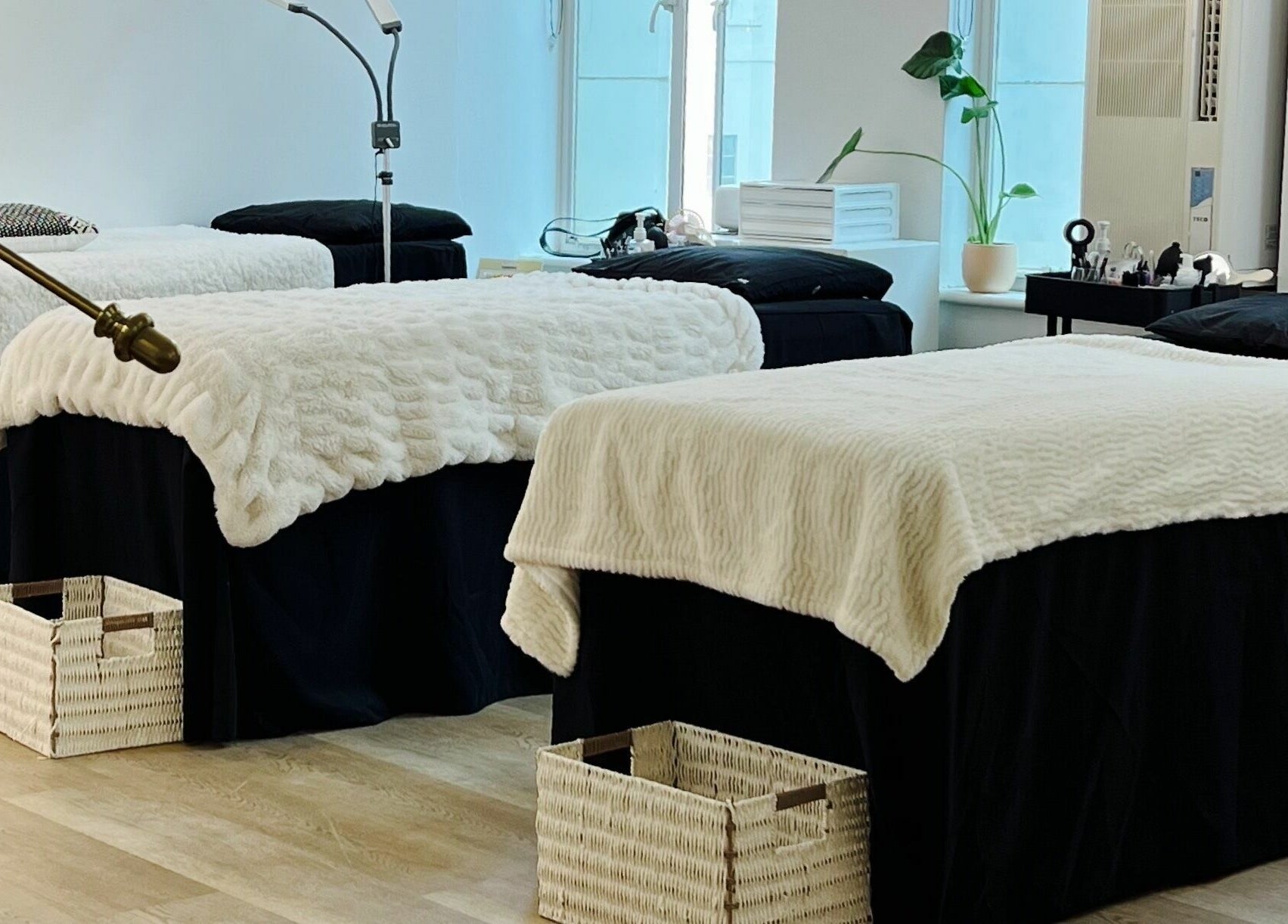 Cozy treatment room at Beauty Moah, Melbourne, Victoria, AU with plush beds and elegant decor.