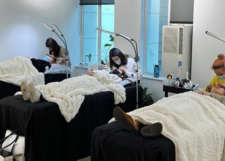 Clients enjoying spa treatments at Beauty Moah, Melbourne, Victoria, AU, enhanced with cozy blankets.