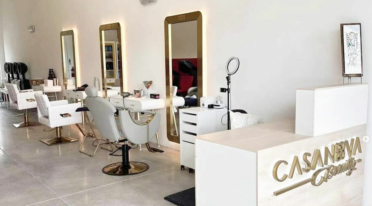 Stylish interior of Casanova Beauty Homestead with chic salon chairs in Homestead, Florida, US.