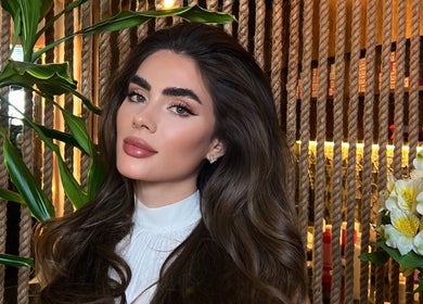 Elegant hairstyle at Paulista Beauty Salon, Dubai, Dubai, AE, showcasing lush interior design.
