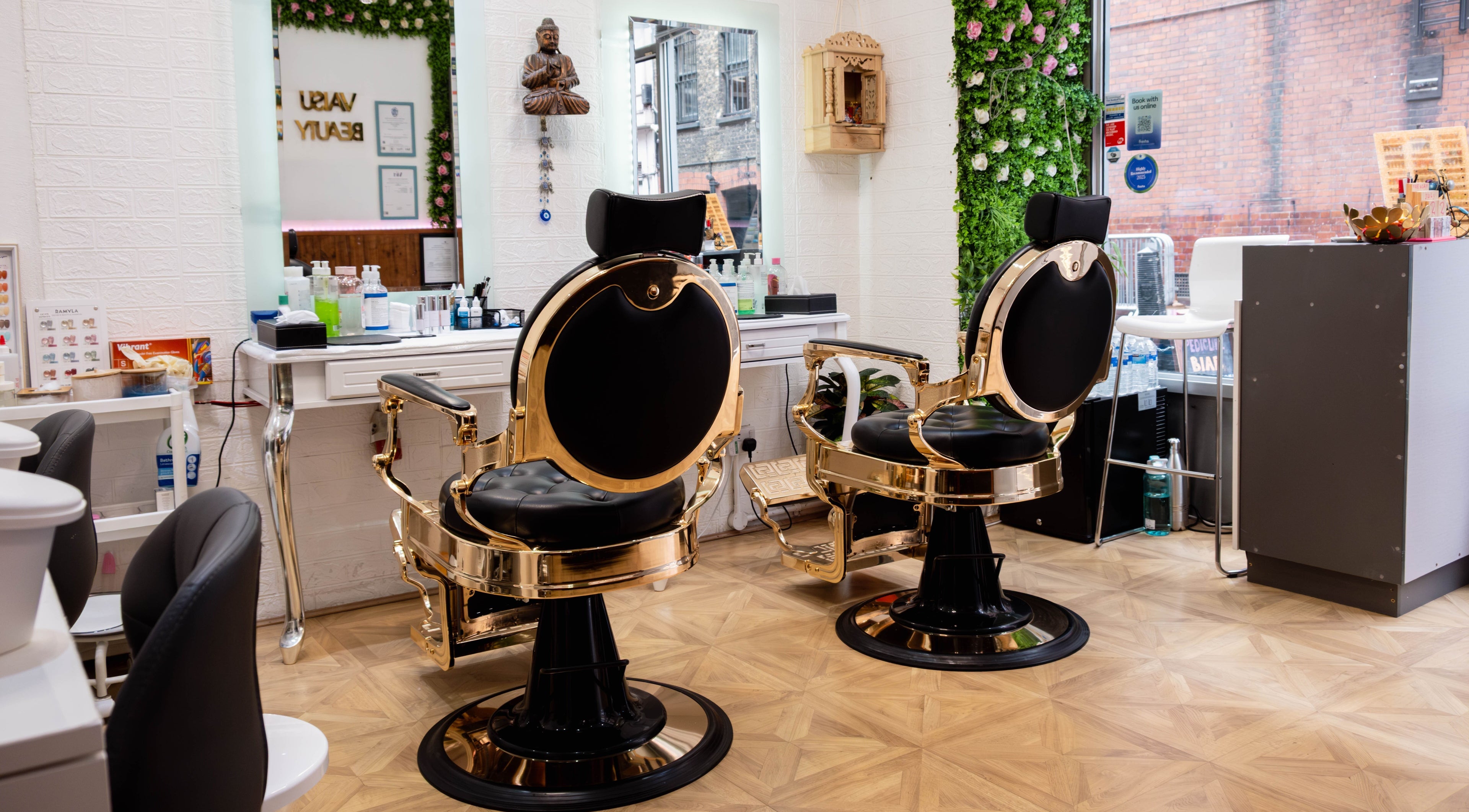 Luxurious salon chairs at Vaisu Beauty, London, England, GB, offer glam setting for beauty treatments.