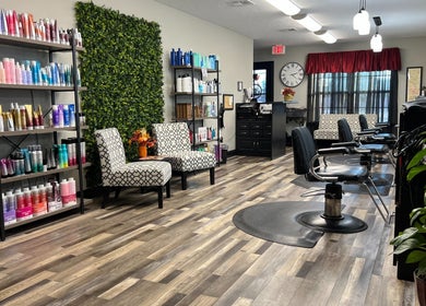Modern beauty interior at Studio K Salon & Spa in Sulphur, Louisiana, US featuring stylish chairs and products.