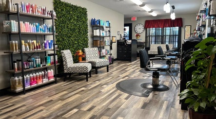 Modern beauty interior at Studio K Salon & Spa in Sulphur, Louisiana, US featuring stylish chairs and products.