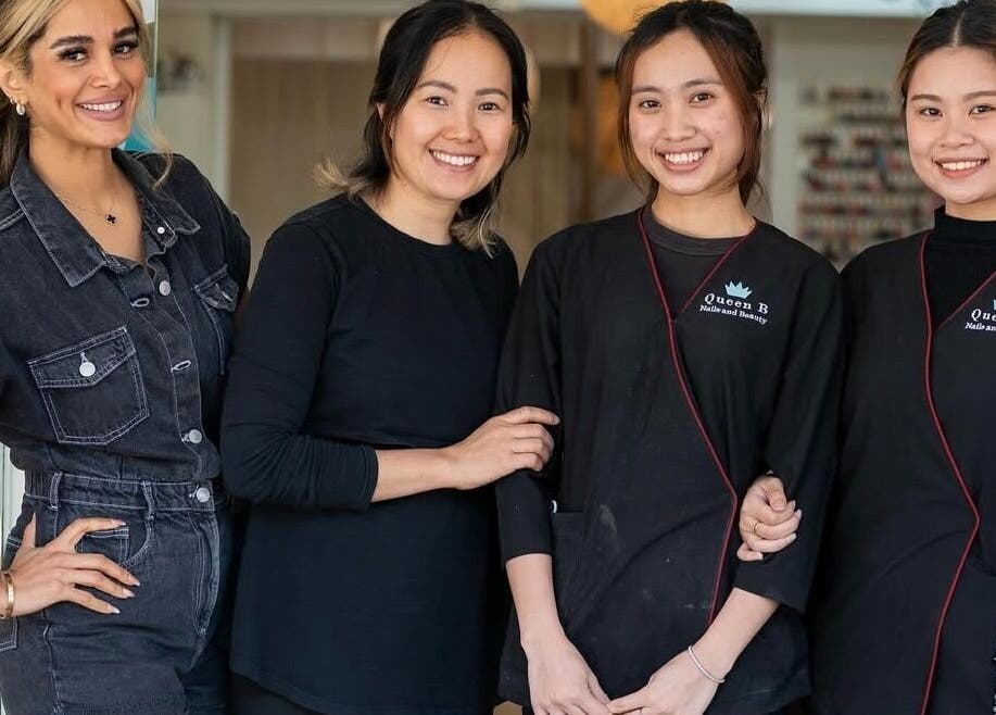 Team smiling at Queen B Skin and Beauty in Melbourne, Victoria, AU.