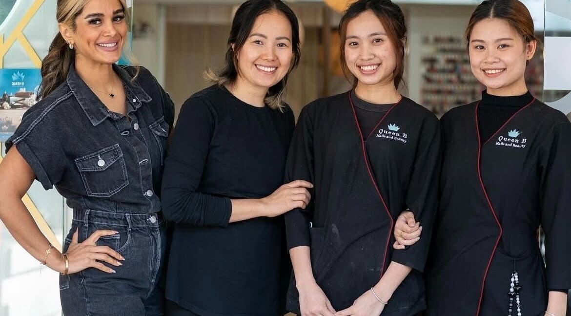 Team smiling at Queen B Skin and Beauty in Melbourne, Victoria, AU.