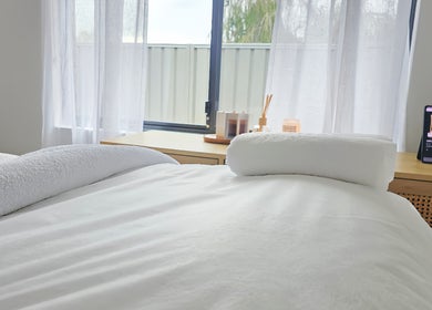 Relaxing spa bed setup at The Siri Beauty & Eyelashes, Busselton, Western Australia, AU; bright and inviting.