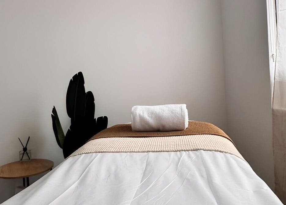 Relaxation room at The Siri Beauty & Eyelashes in Busselton, Western Australia, AU with a massage table ready.