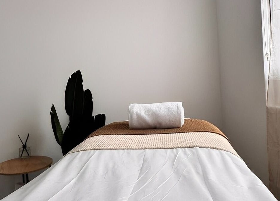 Relaxation room at The Siri Beauty & Eyelashes in Busselton, Western Australia, AU with a massage table ready.