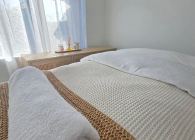 Cozy treatment room at The Siri Beauty & Eyelashes in Busselton, Western Australia, AU with soft linens.