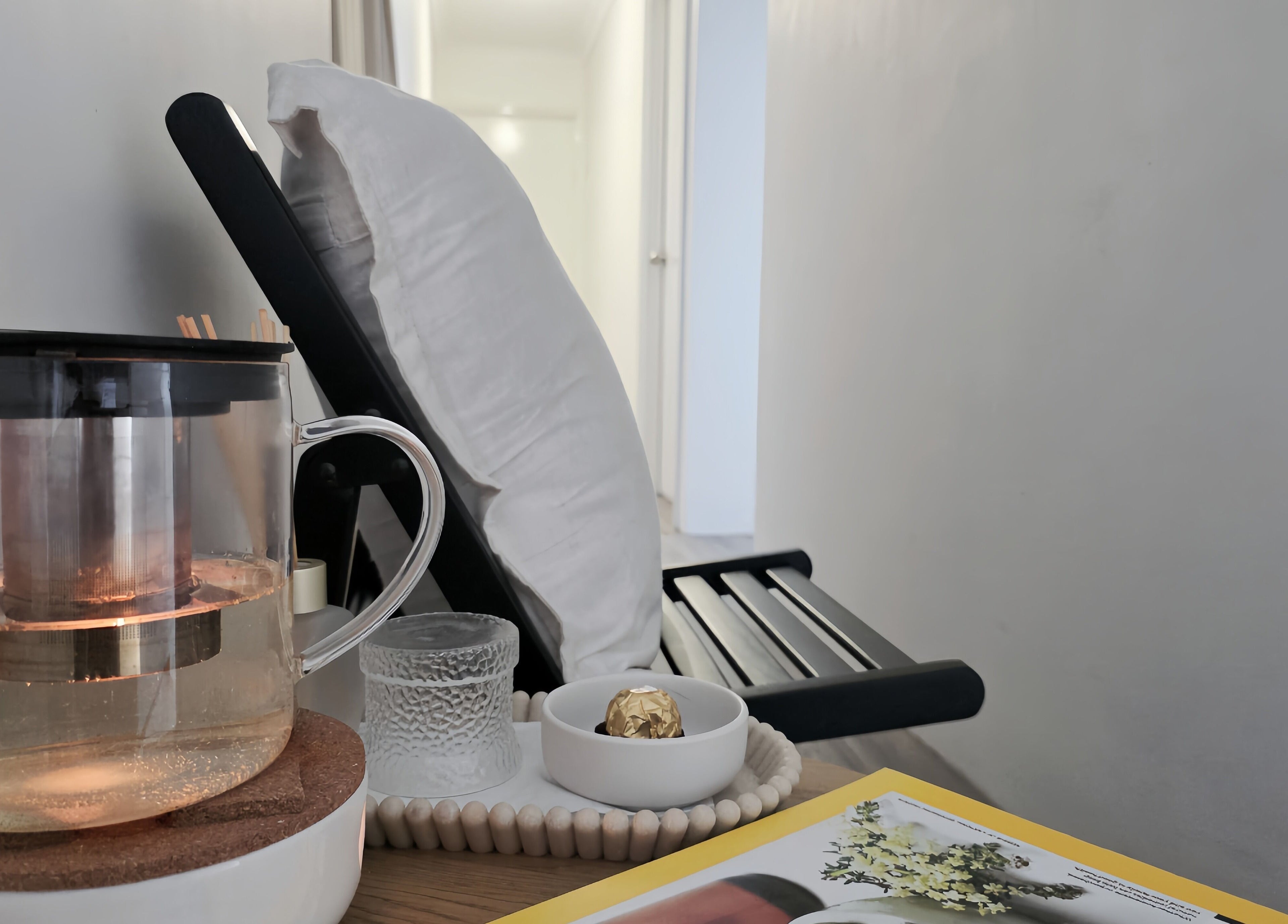 Relaxing corner at The Siri Beauty & Eyelashes, Busselton, Western Australia, featuring tea and cozy seating.
