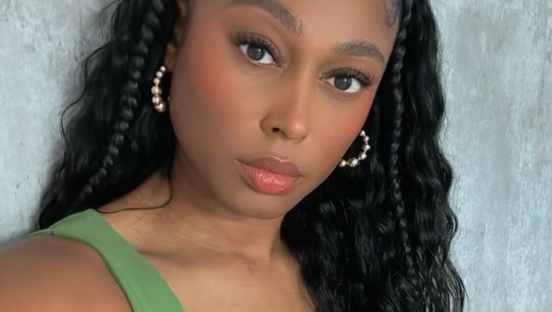 Elegant woman with braided hair at I Am Natorious, Orange Park, Florida, US.