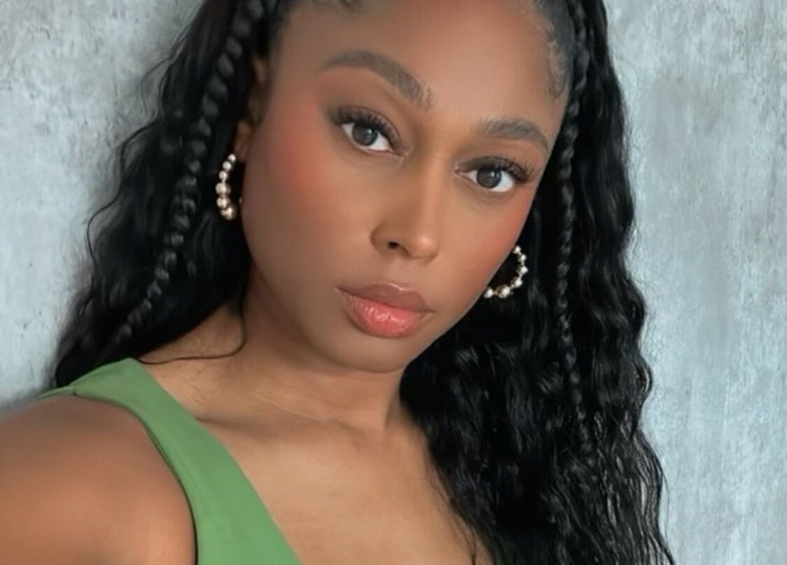 Elegant woman with braided hair at I Am Natorious, Orange Park, Florida, US.