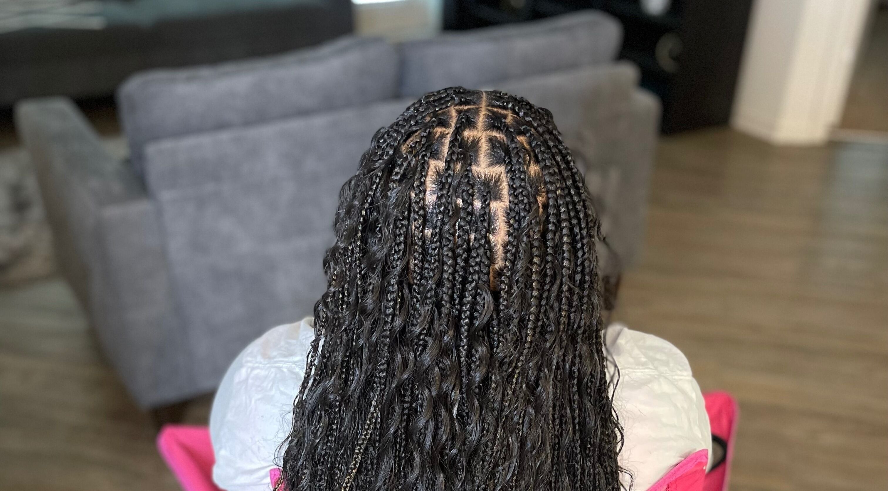 Intricate braids at I Am Natorious in Orange Park, Florida, US showcasing detailed hair artistry.
