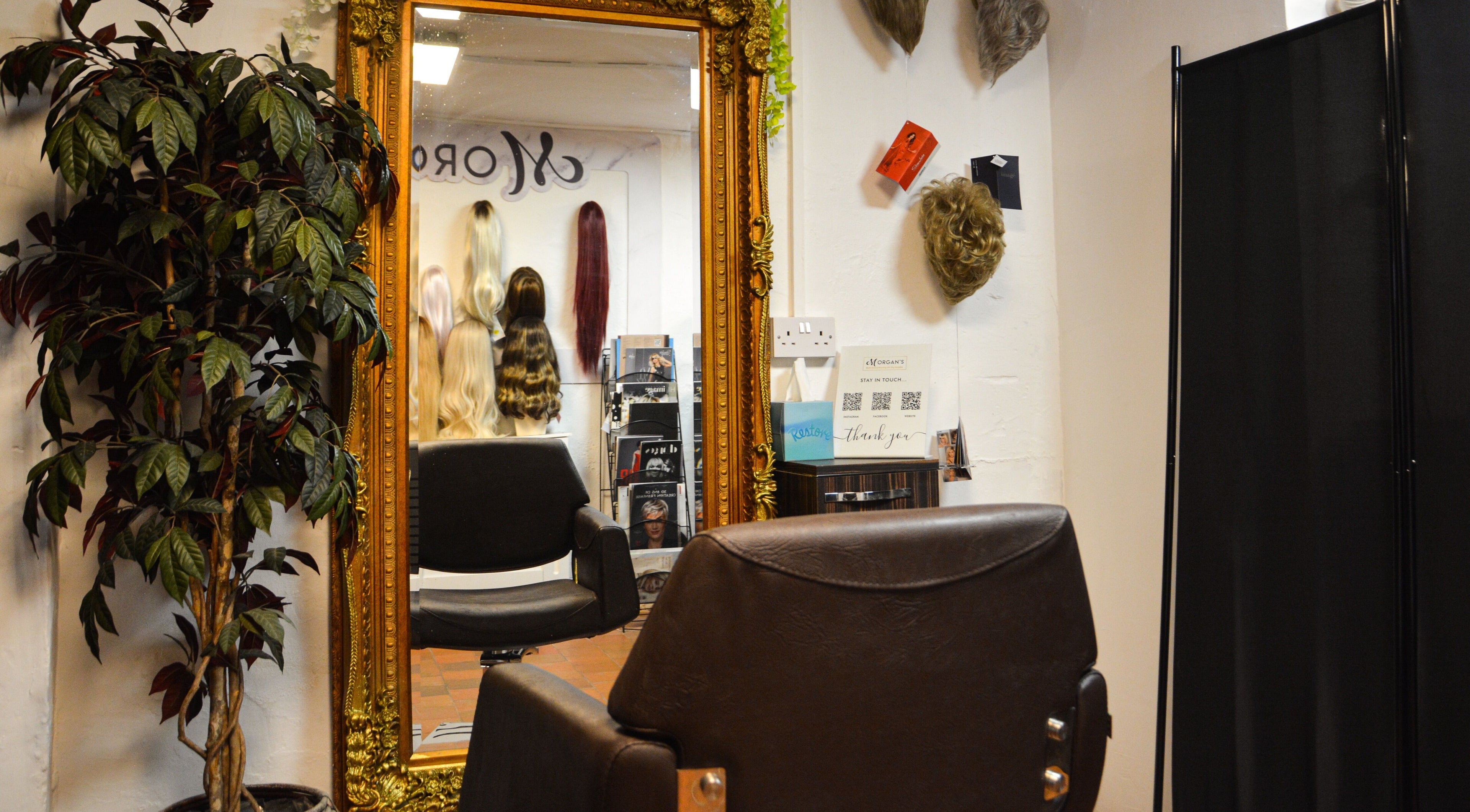 Elegant salon interior at Morgan's Wigs and Hair Loss Solutions Chester, showcasing wigs and styling area in Chester, England, GB.