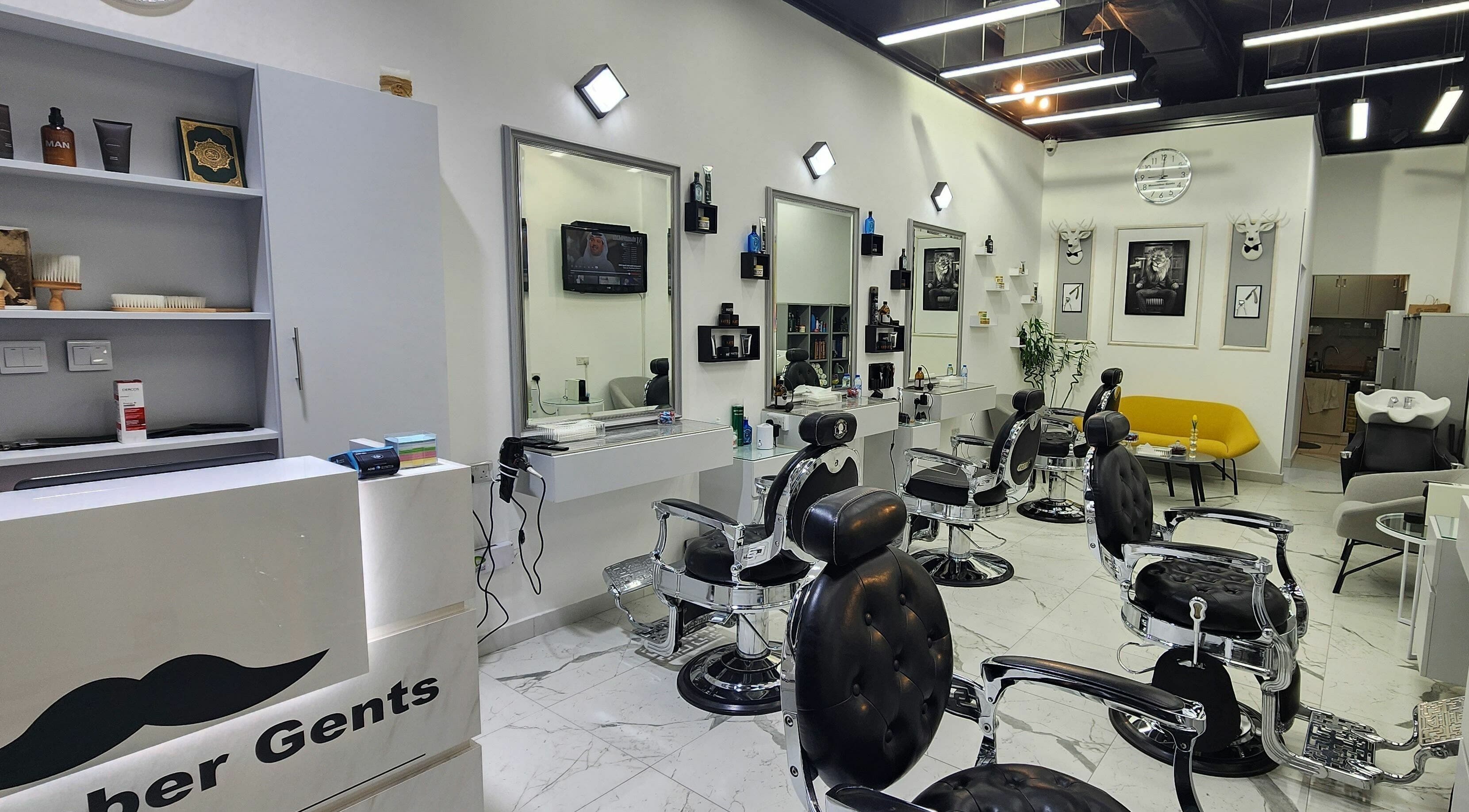 Interior of Movember Gents Salon in Dubai, AE featuring modern barber chairs and stylish decor.