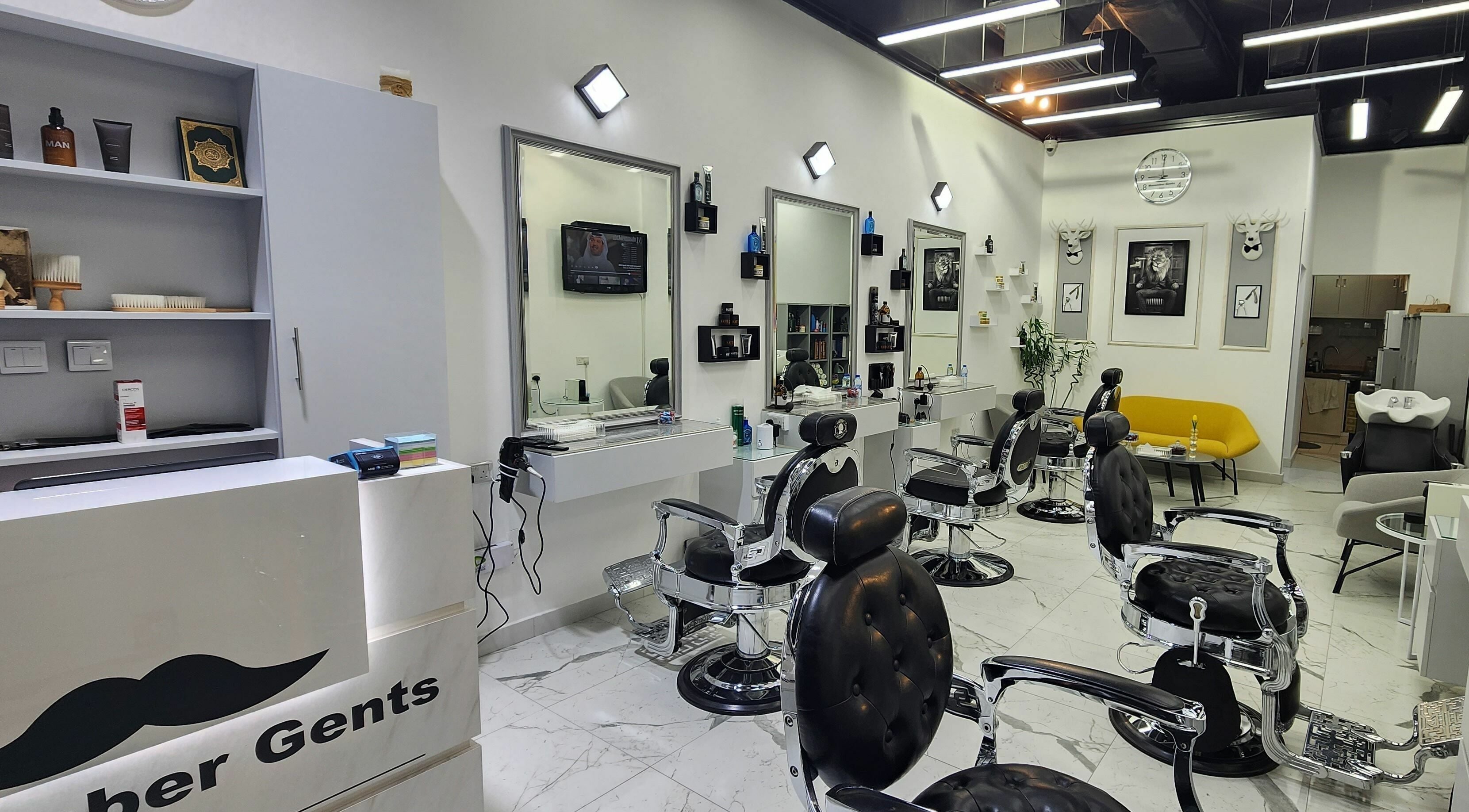 Interior of Movember Gents Salon in Dubai, AE featuring modern barber chairs and stylish decor.