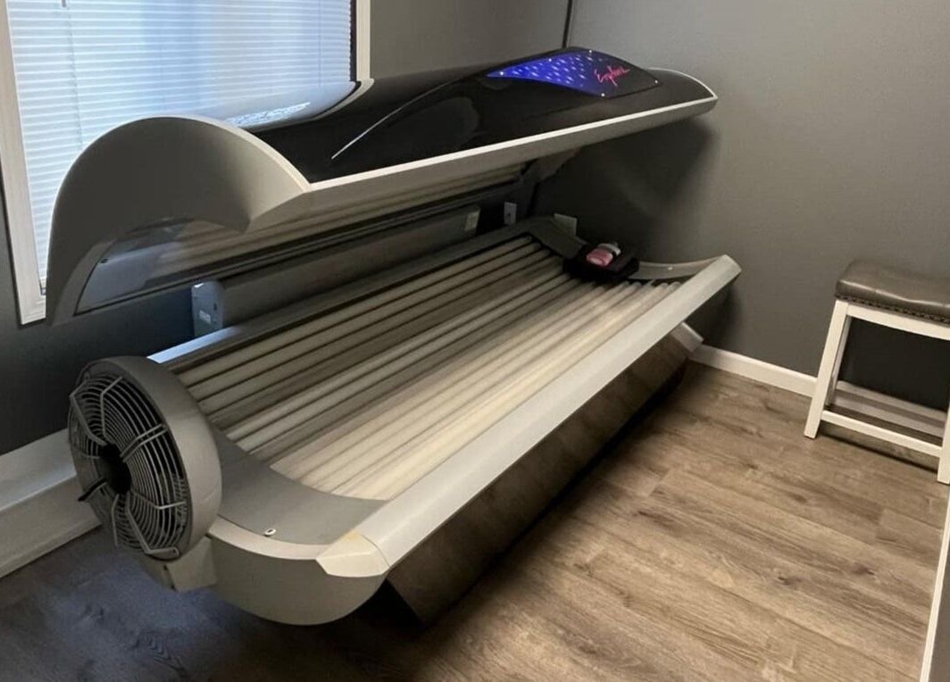 Tanning bed at Indoor Beach, Tomah, Wisconsin, US, offering relaxing wellness experiences.