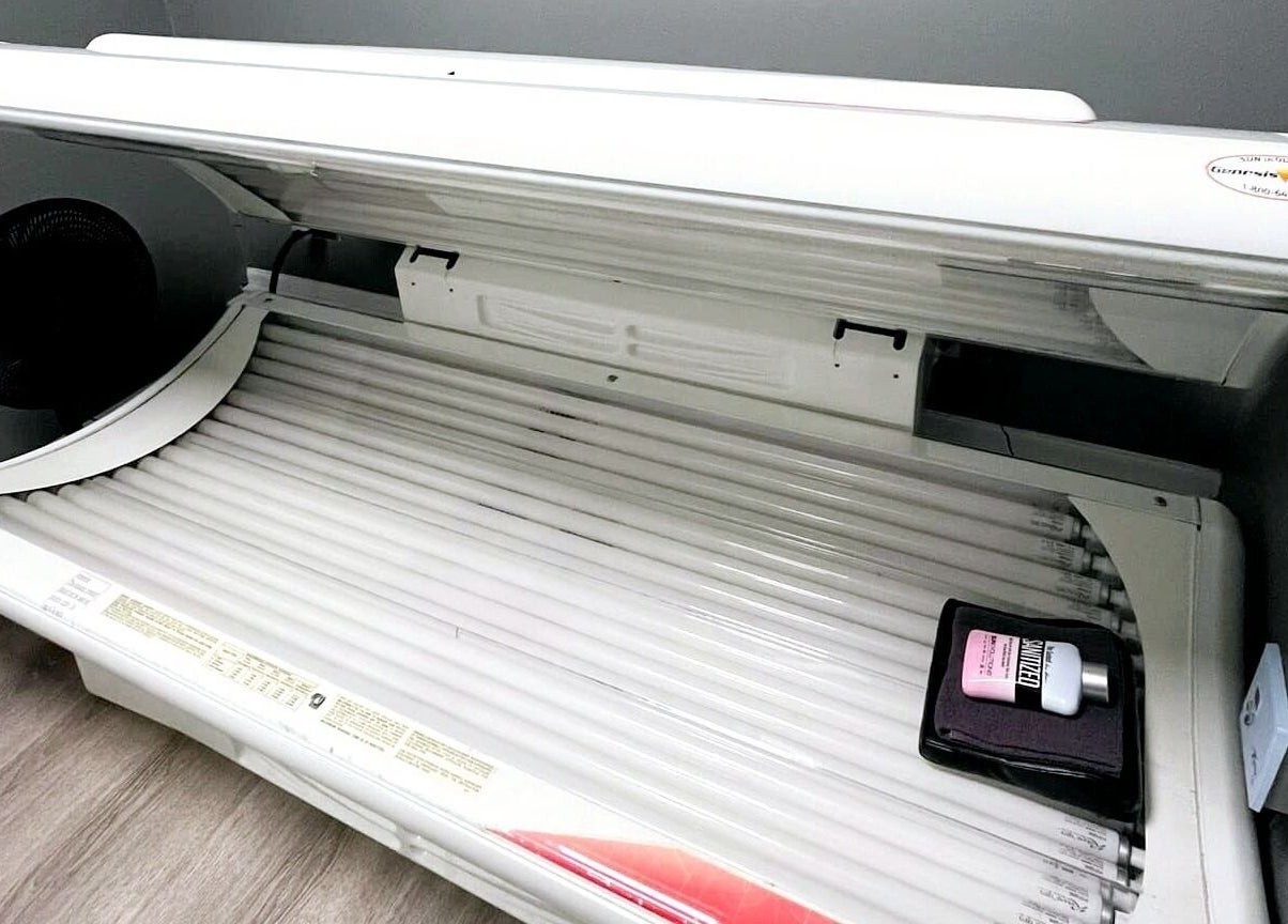 Tanning bed at Indoor Beach in Tomah, Wisconsin, US, offering modern sunbed relaxation.