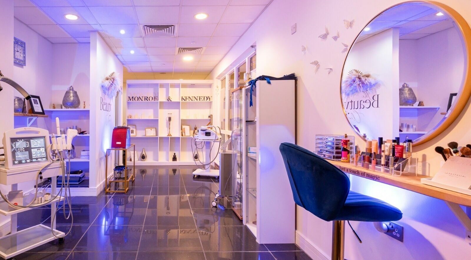 Chic interior of Nume Aesthetic Clinic in Maidstone, England, GB, showcasing beauty and wellness equipment.