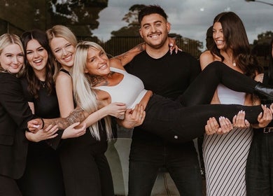Happy team at XO HAIR CO., Melbourne, Victoria, AU, celebrating together.