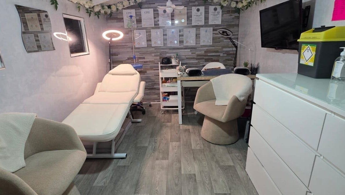 Elegant treatment room at Aesthetics by Wendy, Belfast, Northern Ireland, GB showcasing modern furniture and decor.
