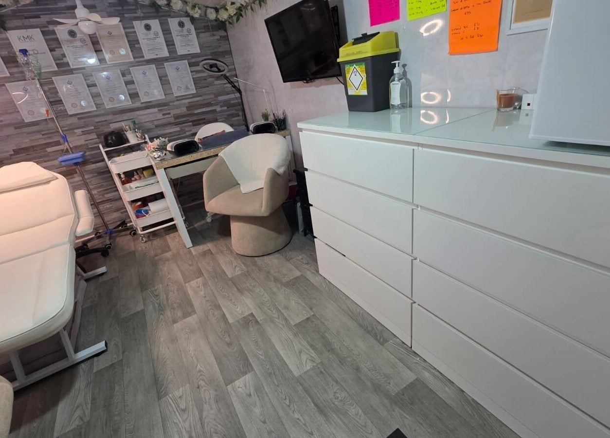 Modern treatment room at Aesthetics by Wendy, Belfast, Northern Ireland, GB featuring sleek furnishings.