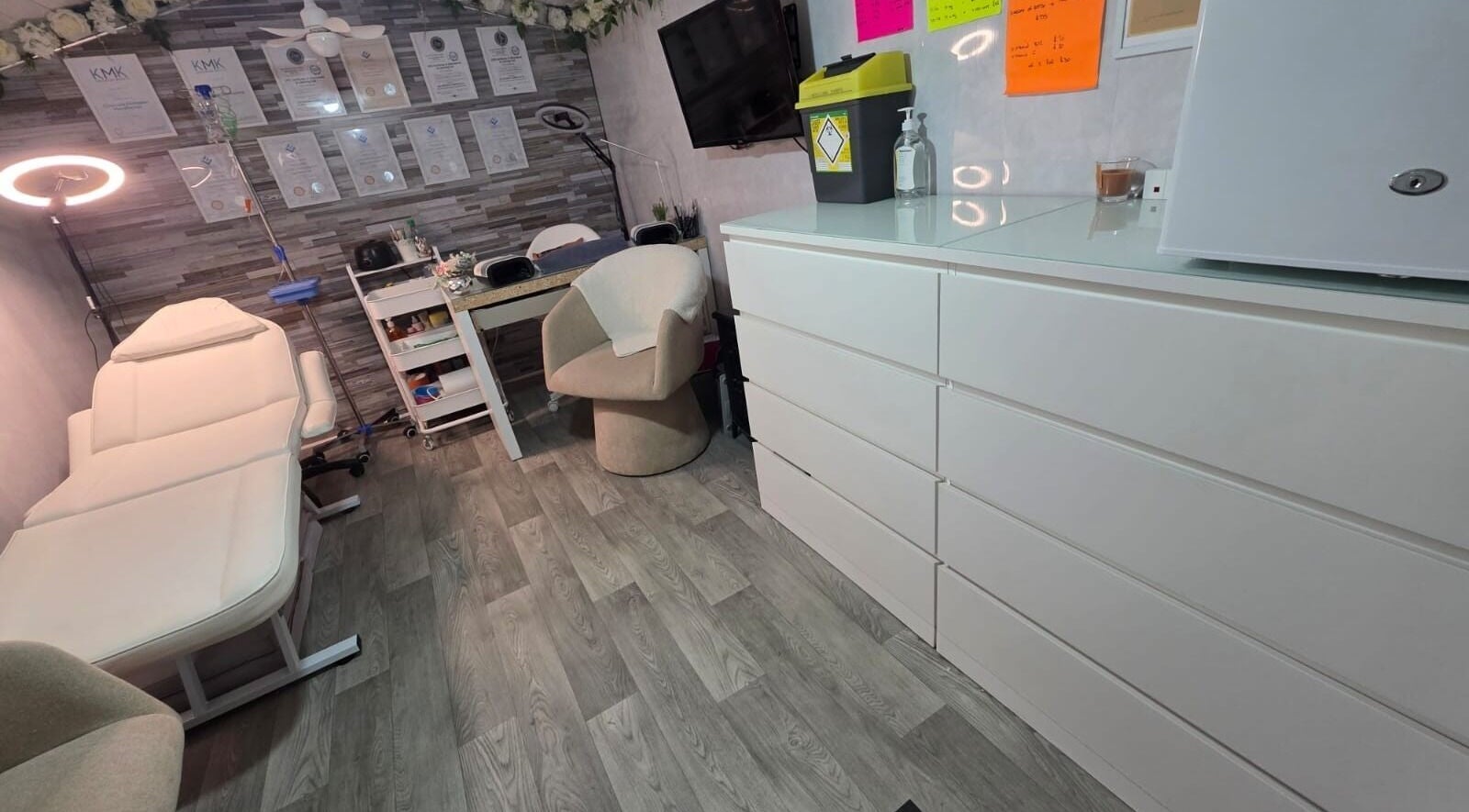 Modern treatment room at Aesthetics by Wendy, Belfast, Northern Ireland, GB featuring sleek furnishings.