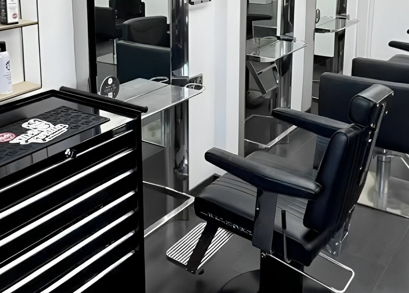 Modern salon chairs and mirrors at Maverick Hair Studio, Angmering, England, GB.