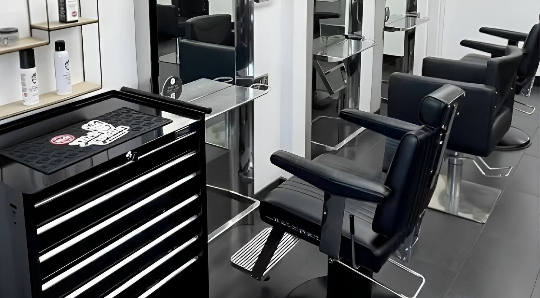Modern salon chairs and mirrors at Maverick Hair Studio, Angmering, England, GB.