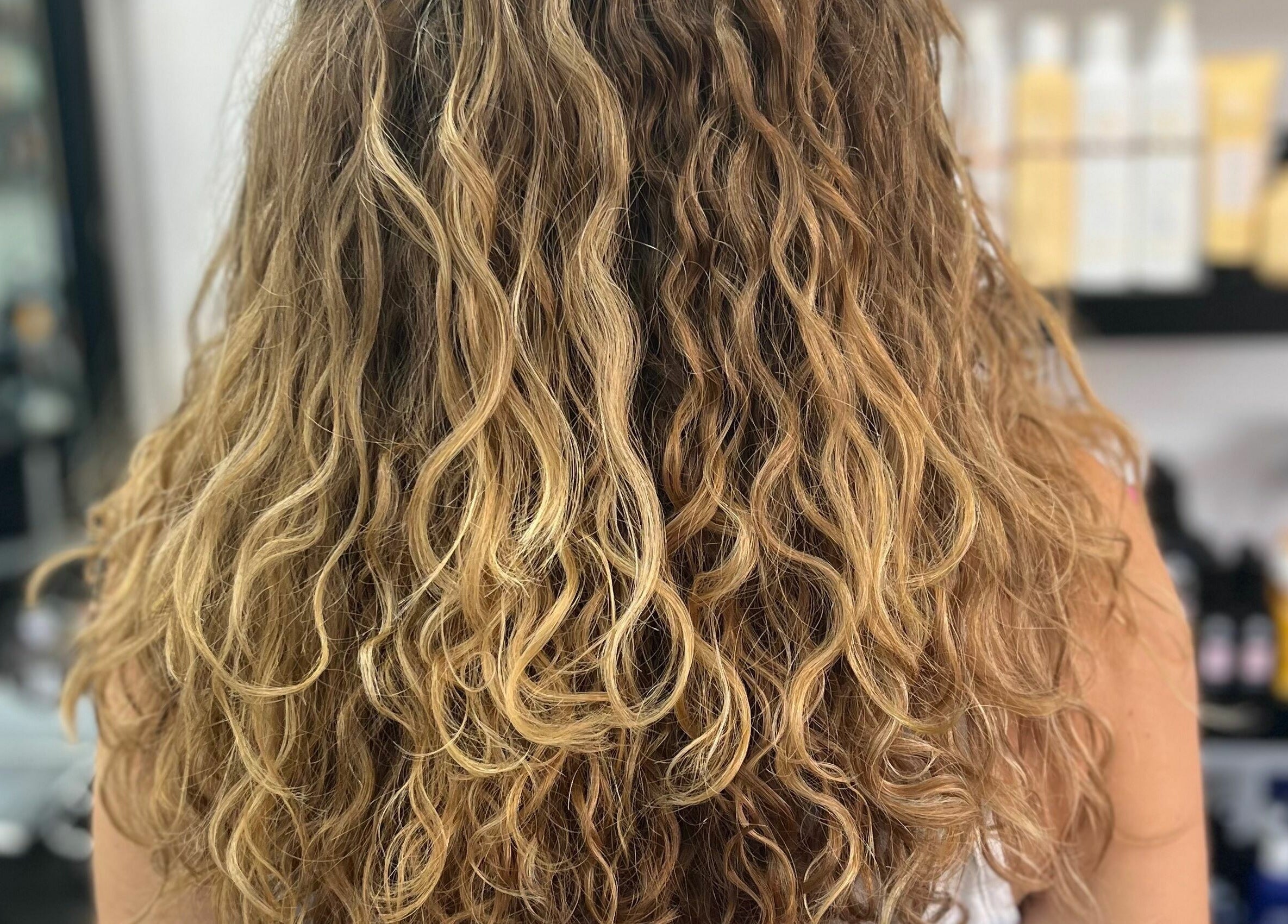 Beautiful curly hairstyle at Maverick Hair Studio, Angmering, England, GB, showcasing luxurious hair treatment.