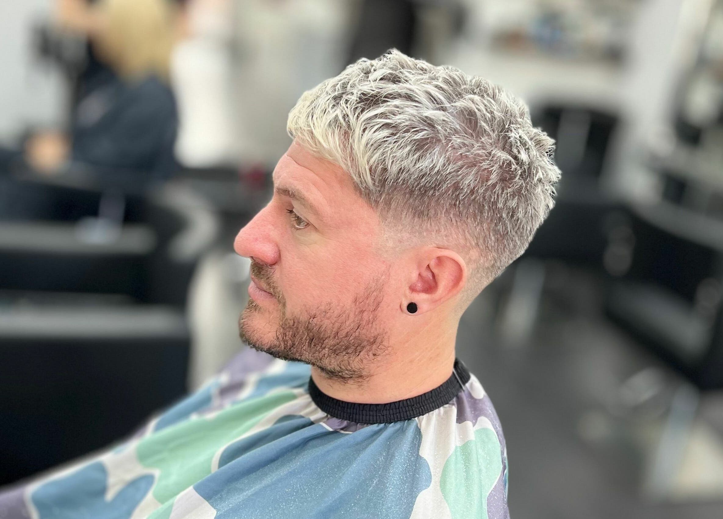 Trendy haircut at Maverick Hair Studio, Angmering, England, GB. Modern style in sleek salon setting.