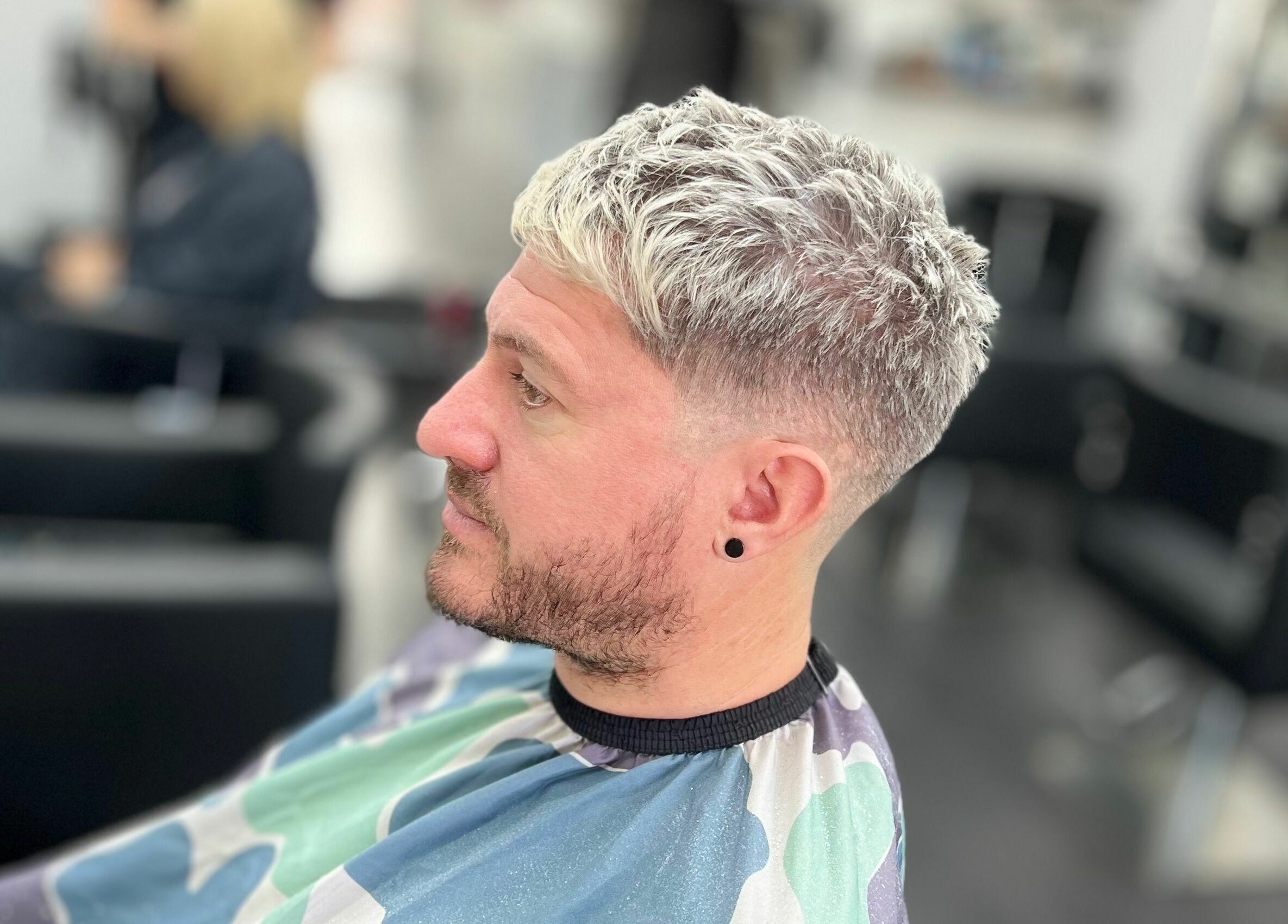 Trendy haircut at Maverick Hair Studio, Angmering, England, GB. Modern style in sleek salon setting.