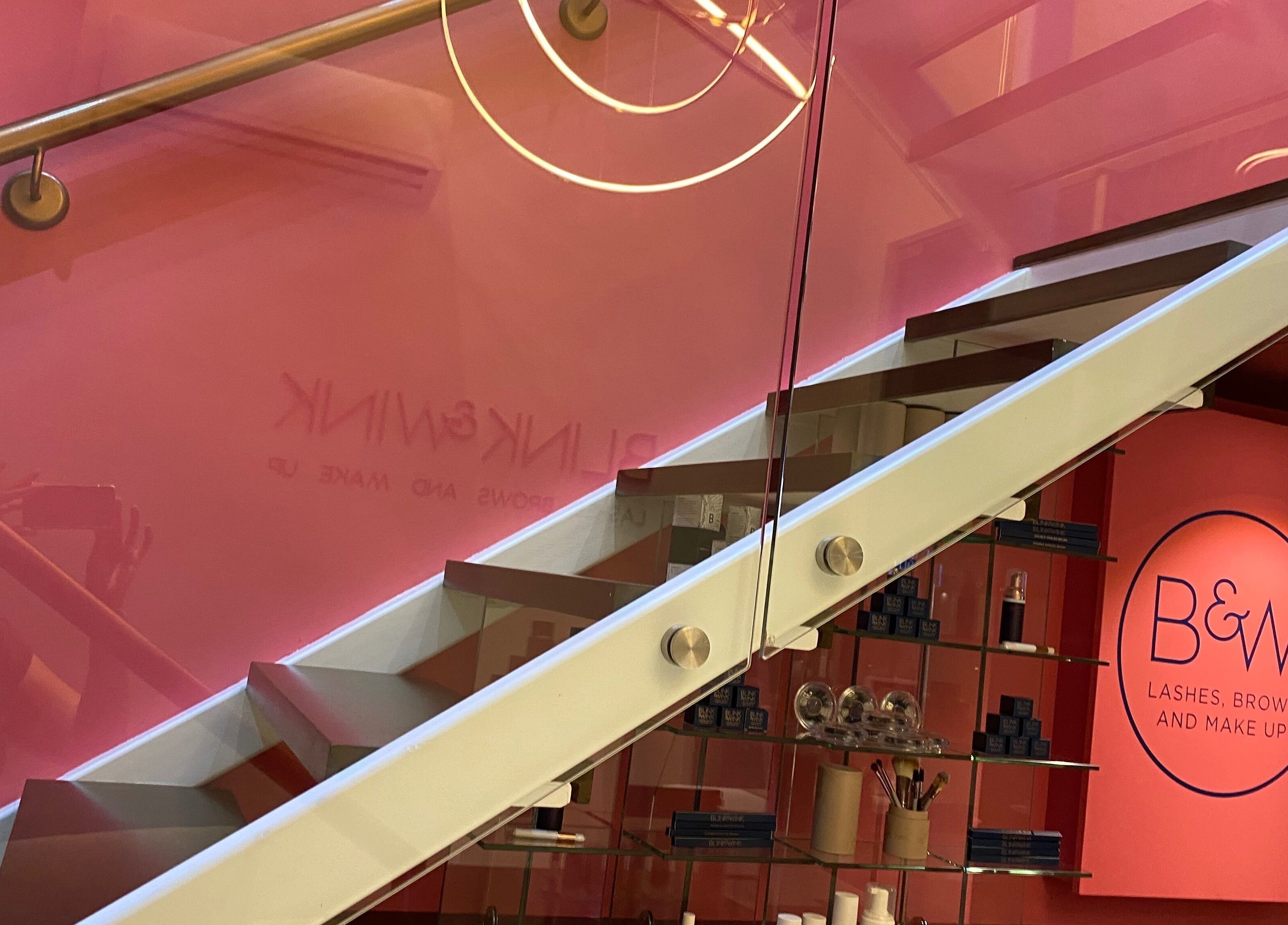 Modern staircase with pink walls at Blink & Wink, Janabiyah, Al-Muḥāfaẓat aš-Šamālīyah, BH.