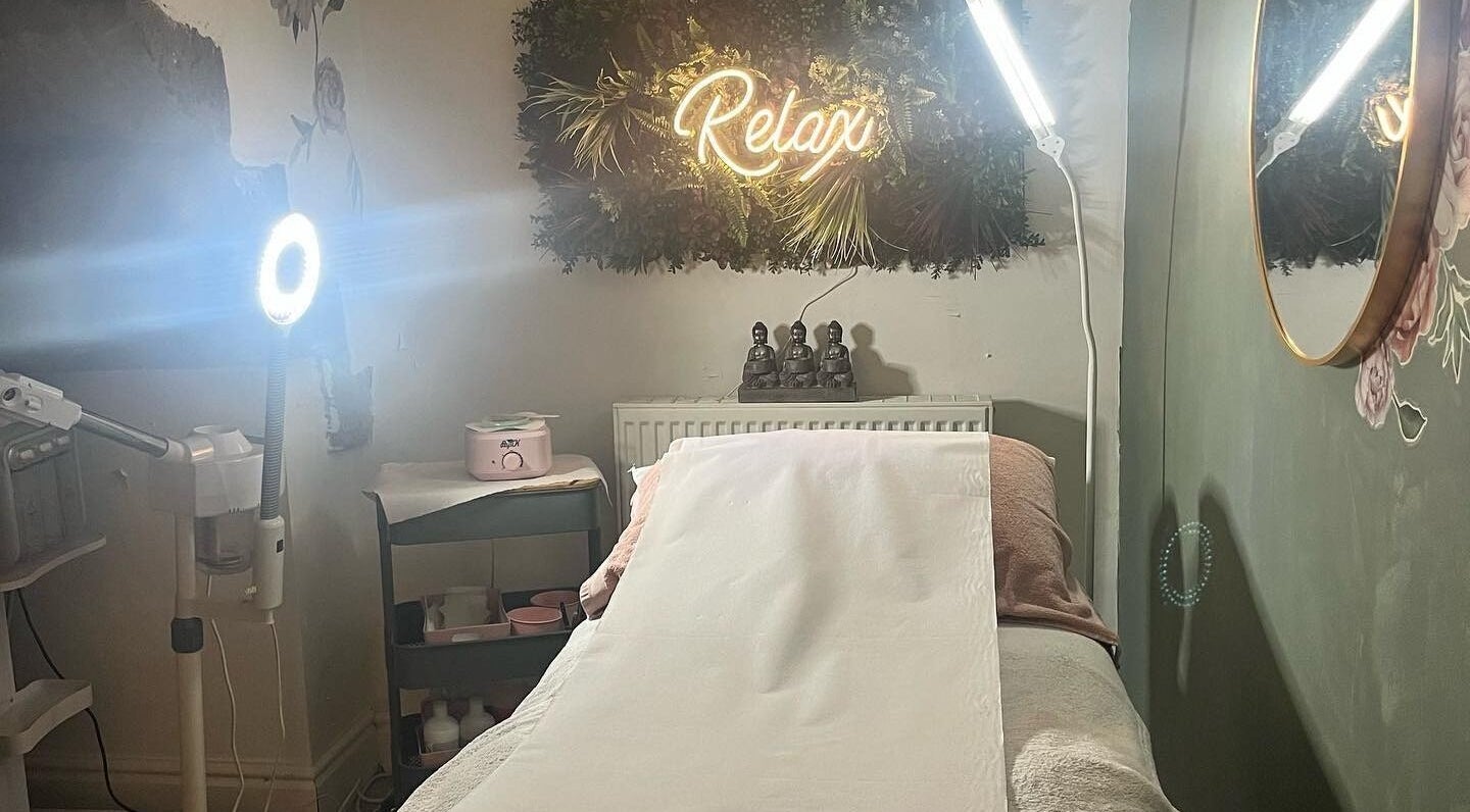 Relaxing therapy room at My Treat in Ramsbottom, England, GB with a cozy treatment bed and ambient lighting.