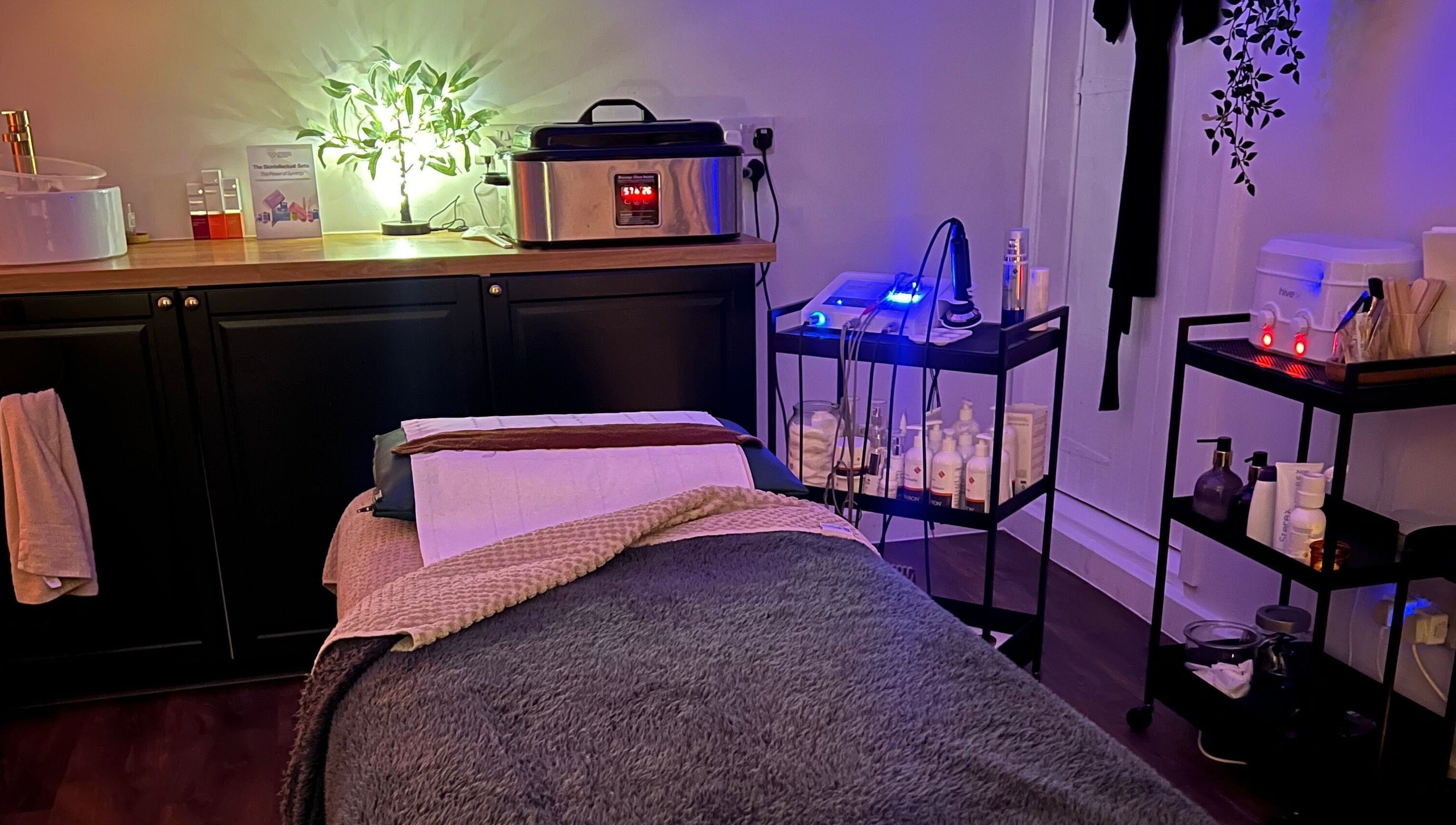 Cozy spa room at Samantha Joyce Beauty, Basingstoke, England, GB featuring a massage bed and calming decor.